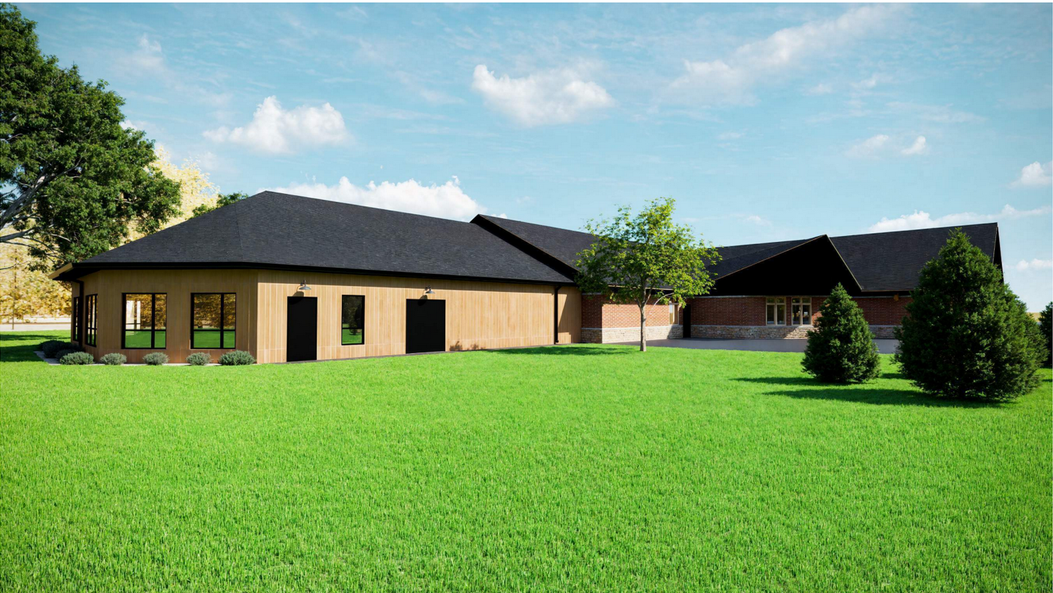Modern building design with a grassy lawn and trees